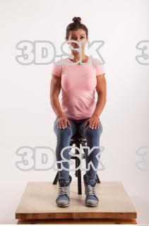 Sitting pose blue jeans pink t shirt of Oxana …